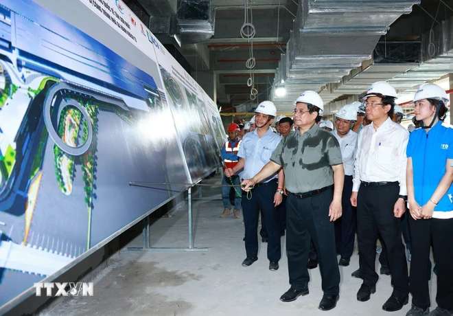 Thủ tướng: Phát triển hạ tầng giao thông làm nền tảng để phát triển bền vững Thủ tướng Phạm Minh Chính kiểm tra tiến độ thi công Dự án nhà ga hành khách T3-Tân Sơn Nhất. (Ảnh: Dương Giang/TTXVN)