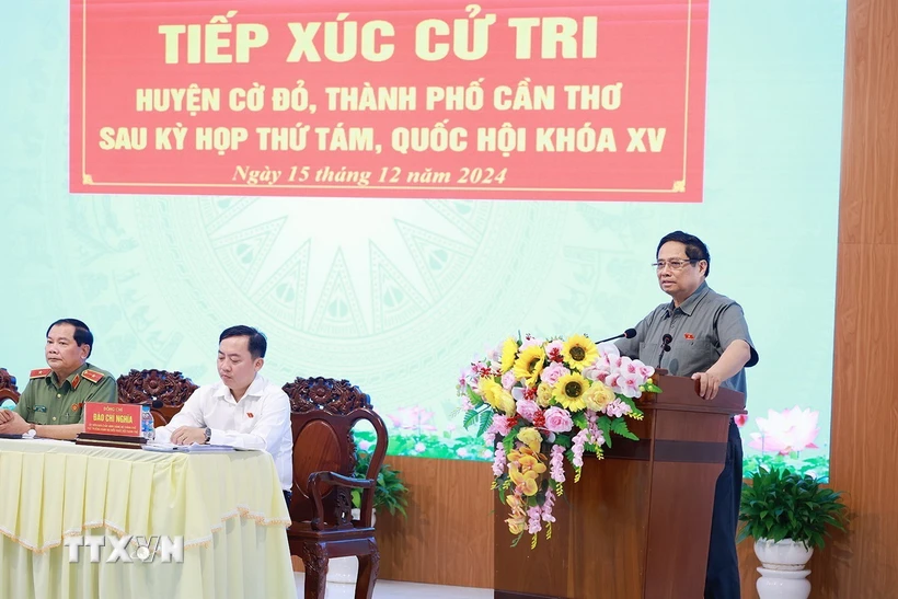 Thủ tướng Phạm Minh Chính phát biểu tại buổi tiếp xúc cử tri huyện Cờ Đỏ, thành phố Cần Thơ. (Ảnh: Dương Giang/TTXVN)