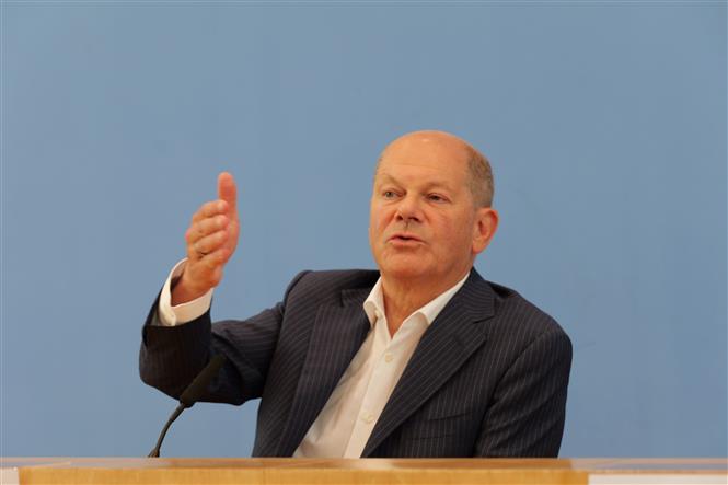 Thủ tướng Đức Olaf Scholz phát biểu tại cuộc họp báo ở Berlin. Ảnh: THX/TTXVN