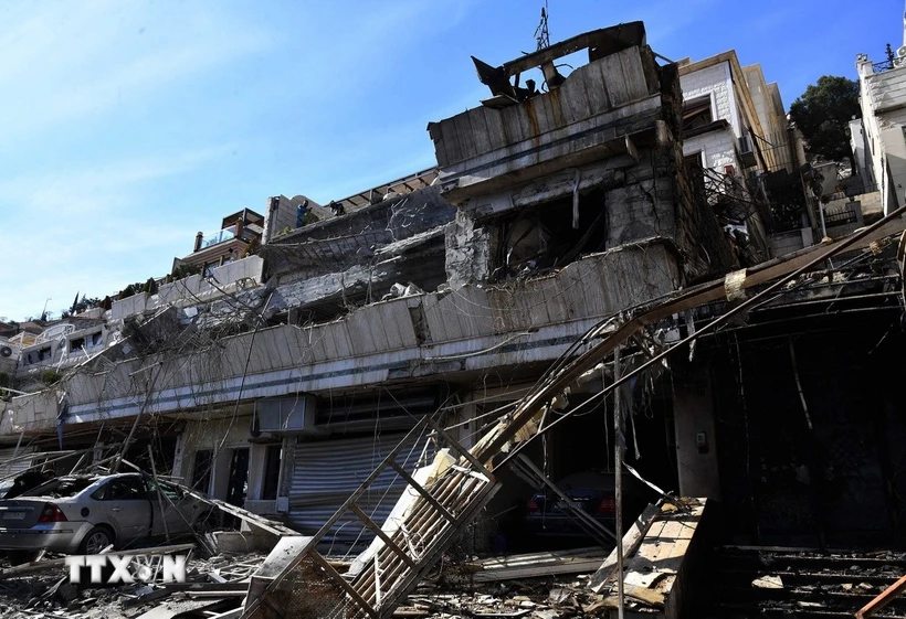 Liên hợp quốc kêu gọi chấm dứt bạo lực ở Syria Tòa nhà bị trúng không kích của Israel tại Damascus, Syria. (Ảnh: THX/TTXVN)