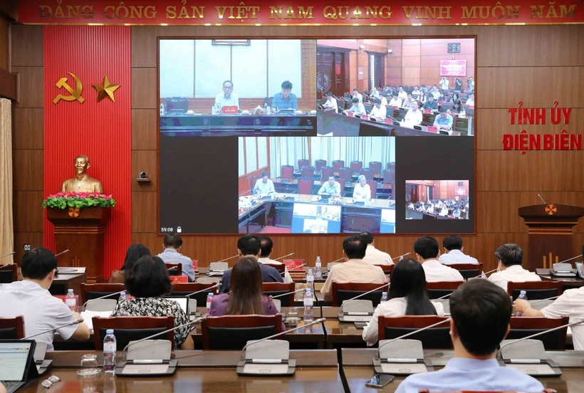 Đoàn của Bộ Chính trị, Ban Bí thư làm việc với Ban Thường vụ Tỉnh ủy Điện Biên Quang cảnh buổi làm việc. (Ảnh: Trung Kiên/TTXVN)